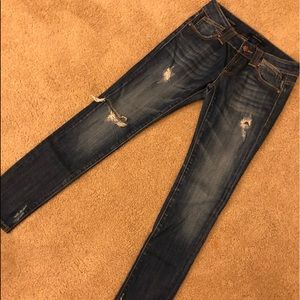 Distressed skinny jeans